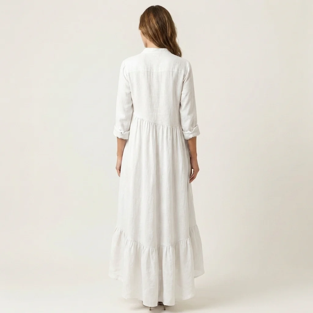 Jilana | Vestido largo con cuello alto, botones delanteros y bajo con volantes