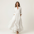 Jilana | Vestido largo con cuello alto, botones delanteros y bajo con volantes