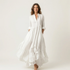 Jilana | Vestido largo con cuello alto, botones delanteros y bajo con volantes